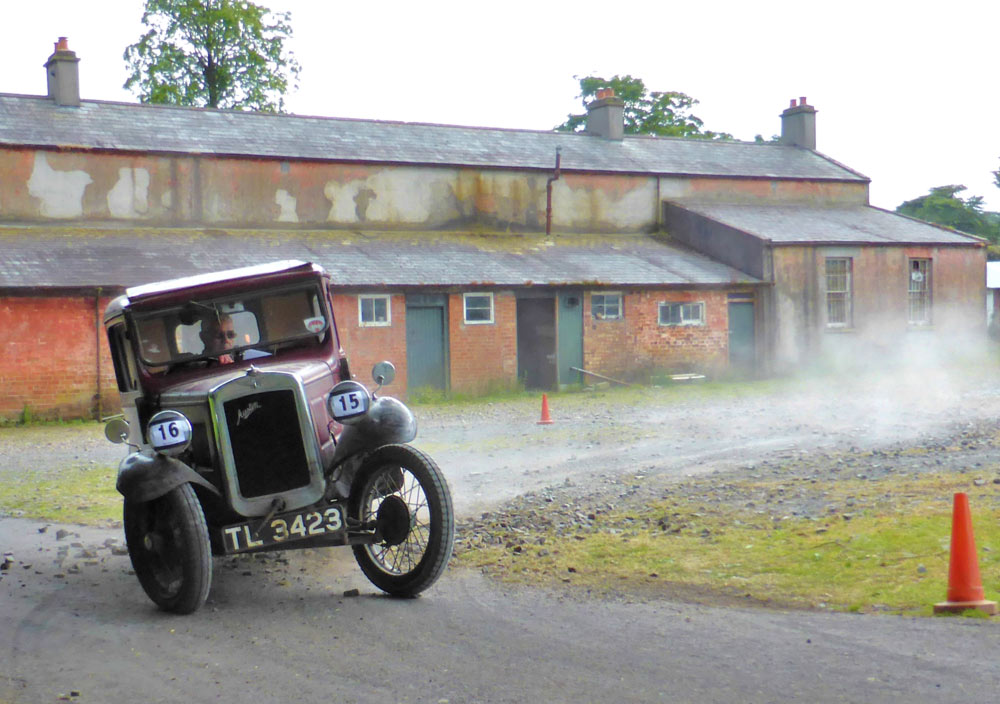 Austin Seven Saloon, cornering sharply at Ulster Vintage Car Club's Ballywalter Driving Test